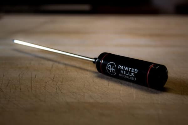 Digital Kitchen & Grill Thermometer on a wooden surface